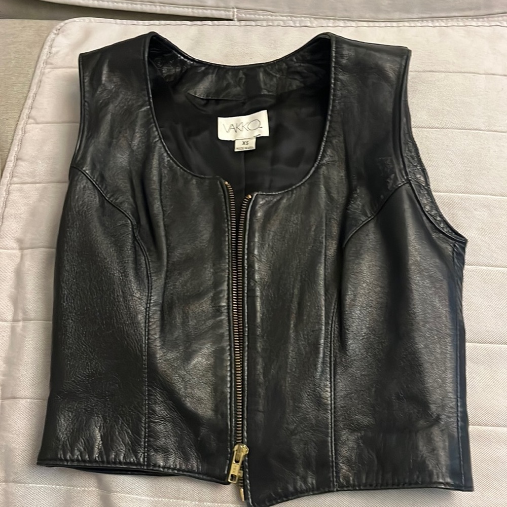 VaKKO size XS leather vest with detachable backpack style.
